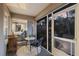 Cozy screened patio with seating area and view of the backyard and bedroom at 13608 11Th E Ter, Bradenton, FL 34212