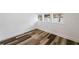 Bedroom featuring wood floors, neutral walls, and windows offering natural light at 1397 43Rd St, Sarasota, FL 34234