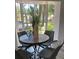 Breakfast nook with natural light, charming decor, and seating for four at 1397 43Rd St, Sarasota, FL 34234