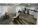 Open-concept living area with abundant natural light, seamlessly connecting the kitchen and living spaces at 1397 43Rd St, Sarasota, FL 34234