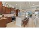 Modern kitchen with granite countertops, stainless steel appliances and a large center island at 16211 Cayman Ln, Punta Gorda, FL 33955