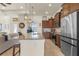 Modern kitchen with stainless steel appliances, granite countertops, and ample cabinet space at 16211 Cayman Ln, Punta Gorda, FL 33955