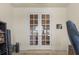 Bright office space features french doors that allow natural light to flow throughout at 16211 Cayman Ln, Punta Gorda, FL 33955