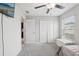 Spacious bedroom featuring a closet, window, and doorway, offering versatility and light at 16621 Sunburst Lake St, Wimauma, FL 33598