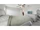 Bright, spacious main bedroom featuring a ceiling fan, and carpeted floors at 16621 Sunburst Lake St, Wimauma, FL 33598