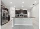 Kitchen featuring stainless steel appliances, granite countertops, and ample cabinet space at 16621 Sunburst Lake St, Wimauma, FL 33598