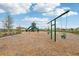 Fun playground with slides, swings, and climbing structures for entertainment at 16621 Sunburst Lake St, Wimauma, FL 33598