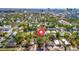 Aerial view of neighborhood showing location with map marker surrounded by lush greenery at 1664 10Th St, Sarasota, FL 34236