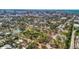 Aerial view of the neighborhood, showcasing the park and nearby city skyline at 1664 10Th St, Sarasota, FL 34236