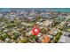 Aerial view of neighborhood showing location with map marker in a tree-filled area at 1664 10Th St, Sarasota, FL 34236