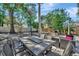 Spacious backyard with ample seating and a grill, great for outdoor gatherings and leisure at 1664 10Th St, Sarasota, FL 34236