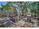 Outdoor space featuring a grill, a firepit, and dining area, perfect for entertaining Gathering and friends at 1664 10Th St, Sarasota, FL 34236