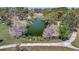 Beautiful pond in a scenic park, surrounded by trees and a walking path at 1664 10Th St, Sarasota, FL 34236