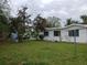 Expansive backyard with lush green grass at 1807 48Th W Ave, Bradenton, FL 34207