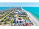 Wonderful aerial view showcases the beachfront condo, beautiful beaches, and blue waters at 1945 Gulf Of Mexico Dr # 110, Longboat Key, FL 34228