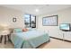 Inviting bedroom with coastal views and plenty of natural light at 1945 Gulf Of Mexico Dr # M2-110, Longboat Key, FL 34228