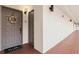 Condo entrance showcasing door number, wreath decor, and a welcoming 'hello' doormat at 1945 Gulf Of Mexico Dr # M2-110, Longboat Key, FL 34228