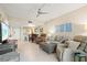 Relaxing living room with comfortable furniture and ocean views at 1945 Gulf Of Mexico Dr # M2-110, Longboat Key, FL 34228