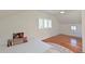Bright bedroom with wood floors, large windows, white walls and a white ceiling at 206 23Rd W St, Bradenton, FL 34205
