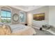 Modern bedroom with shuttered windows and media at 2161 Gulf Of Mexico Dr # 6, Longboat Key, FL 34228