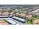 Aerial view of townhome community, with parking and green spaces at 2446 Clubhouse Cir # 202, Sarasota, FL 34232