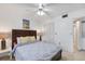 Bright bedroom featuring a queen bed, and closet in a well-lit room at 2446 Clubhouse Cir # 202, Sarasota, FL 34232