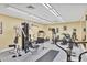 Well-equipped gym with treadmills, elliptical machines, weight machines and free weights offers residents a convenient workout space at 2446 Clubhouse Cir # 202, Sarasota, FL 34232