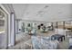 Common room with dining and seating areas and a view of the pool at 2446 Clubhouse Cir # 202, Sarasota, FL 34232