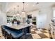 Upscale kitchen with a large island, modern appliances, and elegant finishes in the clubhouse at 26800 Pavin Dr, Englewood, FL 34223