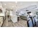Open living space with a seamless flow between the kitchen, dining area, and living room at 26800 Pavin Dr, Englewood, FL 34223
