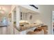 Close up of the wet bar area with granite countertop, cabinetry and a sink at 3151 Bayou Sound, Longboat Key, FL 34228