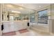 Spacious bathroom featuring a soaking tub, large mirrors, dual sinks and natural light at 3151 Bayou Sound, Longboat Key, FL 34228