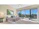 Serene bedroom with glass doors to lanai, creating a peaceful retreat with a picturesque view at 3151 Bayou Sound, Longboat Key, FL 34228