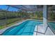 Enclosed pool and scenic views of lush greenery at 3151 Bayou Sound, Longboat Key, FL 34228