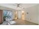 Bedroom with neutral carpet and access to a glassed in private outside area at 3467 Byron Ln, Longboat Key, FL 34228