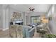 Spacious living room with plenty of natural light, comfortable seating, and a beautiful view at 3715 80Th E Dr, Sarasota, FL 34243