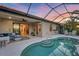 Screened-in pool and lanai with ample seating offer a seamless indoor-outdoor living experience at 3715 80Th E Dr, Sarasota, FL 34243