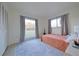Bright bedroom with two large windows, a comfortable bed, and closet space at 4015 11Th W Ave, Bradenton, FL 34205