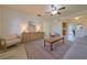 Inviting living room with a ceiling fan and a cozy seating area featuring a comfortable sofa at 4015 11Th W Ave, Bradenton, FL 34205