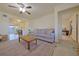 Bright living room with open layout, ceiling fan, and comfortable sofa, creating a welcoming atmosphere at 4015 11Th W Ave, Bradenton, FL 34205
