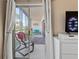 Screened balcony featuring views of landscaping and living space at 4240 Ironwood Cir # 302A, Bradenton, FL 34209