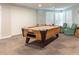 A billiards room with a table and chairs perfect for entertaining at 4240 Ironwood Cir # 302A, Bradenton, FL 34209