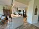 Eat-in kitchen featuring quartz countertops, stainless appliances, and updated cabinetry at 4240 Ironwood Cir # 302A, Bradenton, FL 34209