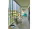 Relaxing sunroom with comfortable seating, allowing natural light and scenic views at 4240 Ironwood Cir # 302A, Bradenton, FL 34209