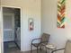 Common laundry room facility with seating area and decor at 4240 Ironwood Cir # 302A, Bradenton, FL 34209