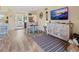 Open-concept living space with dining area, stylish furnishings, and lots of natural light at 4240 Ironwood Cir # 302A, Bradenton, FL 34209