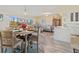 Spacious open layout blending kitchen, dining, and living areas with nice flooring and natural light at 4240 Ironwood Cir # 302A, Bradenton, FL 34209