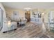 Inviting living room featuring modern decor, stylish furniture, and an open layout to the breakfast bar at 4240 Ironwood Cir # 302A, Bradenton, FL 34209