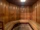 Relaxing community sauna with wooden benches and walls at 4240 Ironwood Cir # 302A, Bradenton, FL 34209