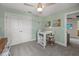 Inviting bedroom featuring a study nook with a small table, perfect for work and play at 44240 Creekside Run Ln, Punta Gorda, FL 33982